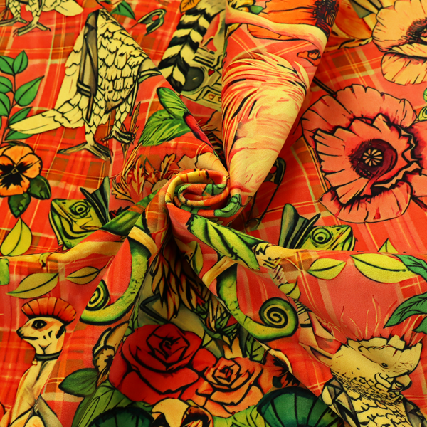 A busy, maximalist vintage-style fabric featuring a vibrant orange plaid background densely patterned with rock-and-roll animals in leather jackets and punk-inspired motifs, including cockatoos, flamingos, chameleons, a lion with a mohawk, meerkats, and lemurs intertwined with large flowers like poppies and pansies.