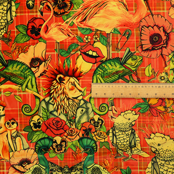A busy, maximalist vintage-style fabric featuring a vibrant orange plaid background densely patterned with rock-and-roll animals in leather jackets and punk-inspired motifs, including cockatoos, flamingos, chameleons, a lion with a mohawk, meerkats, and lemurs intertwined with large flowers like poppies and pansies.