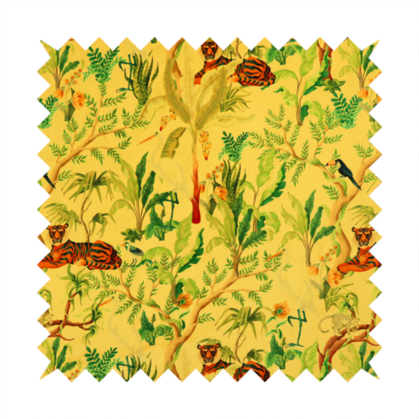 A vibrant yellow fabric featuring a dense tropical jungle pattern with tigers lounging on branches, toucans, herons, monkeys, and lush green foliage.   
