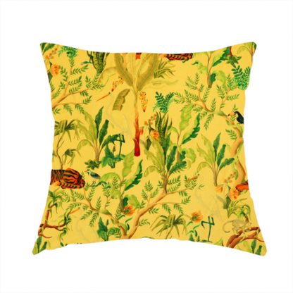 The fabric used to create this handmade cushion is a vibrant yellow fabric featuring a dense tropical jungle pattern with tigers lounging on branches, toucans, herons, monkeys, and lush green foliage.   