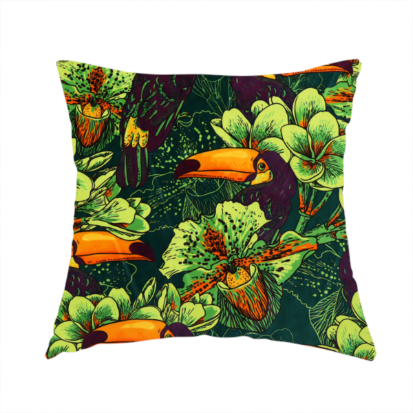 The fabric used to create this handmade cushion is a dark green fabric densely patterned with toucans featuring large orange-and-yellow beaks, surrounded by glowing light green and orange tropical flowers.   