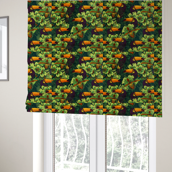 The fabric used to create these Roman blinds is a dark green fabric densely patterned with toucans featuring large orange-and-yellow beaks, surrounded by glowing light green and orange tropical flowers.   