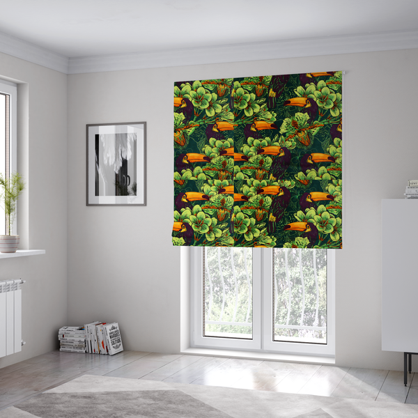 The fabric used to create these Roman blinds is a dark green fabric densely patterned with toucans featuring large orange-and-yellow beaks, surrounded by glowing light green and orange tropical flowers.   