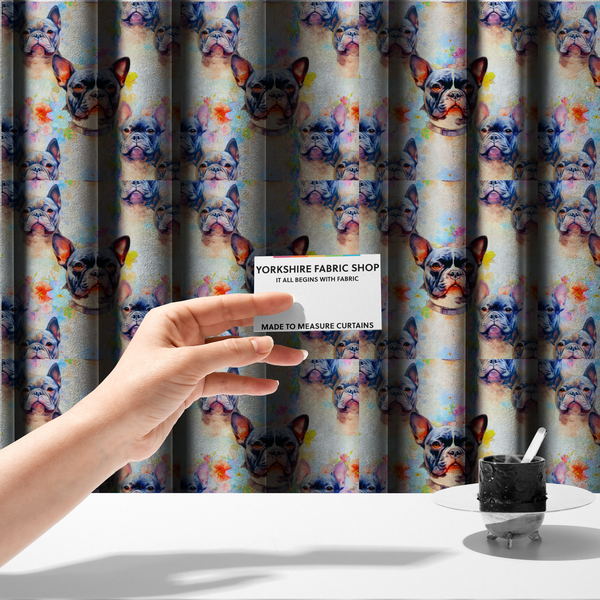 The fabric used to create these made-to-measure curtains is a watercolour-style fabric pattern featuring repeated portraits of French Bulldogs surrounded by soft, pastel splashes of flowers and abstract colour.   