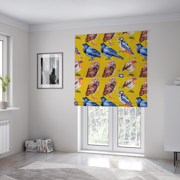 The fabric used to create these Roman blinds is a vibrant yellow fabric patterned with a repeat design of various illustrated birds, including owls, robins, woodpeckers, and bluebirds