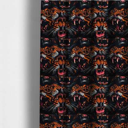 The fabric used to create these made-to-measure curtains is a dark patterned fabric featuring an aggressive, repeated motif of roaring tigers with bared fangs, detailed in vibrant orange, white, and pink against a black background.   