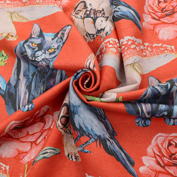 A red fabric patterned with hand-drawn gothic illustrations of black cats, crows, animal skulls, mushrooms, and roses featuring an organic style.