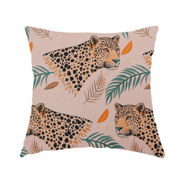The fabric used to create this handmade cushion is a pink fabric patterned with hand-drawn jungle illustrations of leopards and tropical leaves featuring an organic style.   