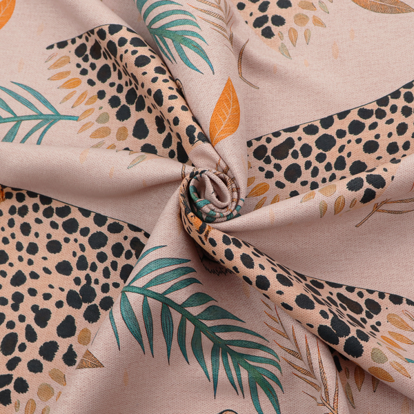 A pink fabric patterned with hand-drawn jungle illustrations of leopards and tropical leaves featuring an organic style.   