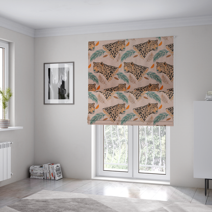The fabric used to create these Roman blinds is a pink fabric patterned with hand-drawn jungle illustrations of leopards and tropical leaves featuring an organic style.   