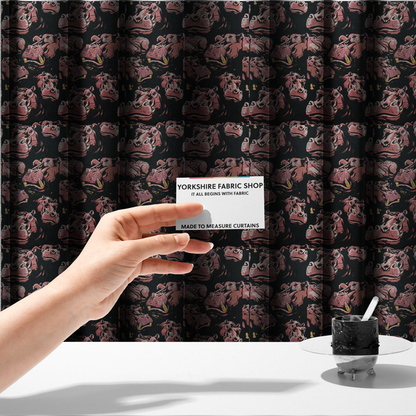 The fabric used to create these made-to-measure curtains is a dark grey fabric patterned with hand-drawn illustrations of hippos featuring an organic style.