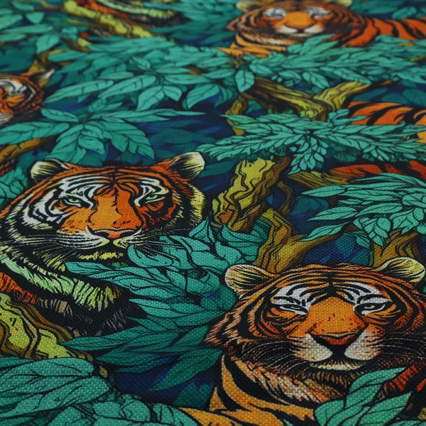 A dark blue fabric patterned with hand-drawn jungle illustrations of tigers nestled among dense green leaves featuring an organic style.