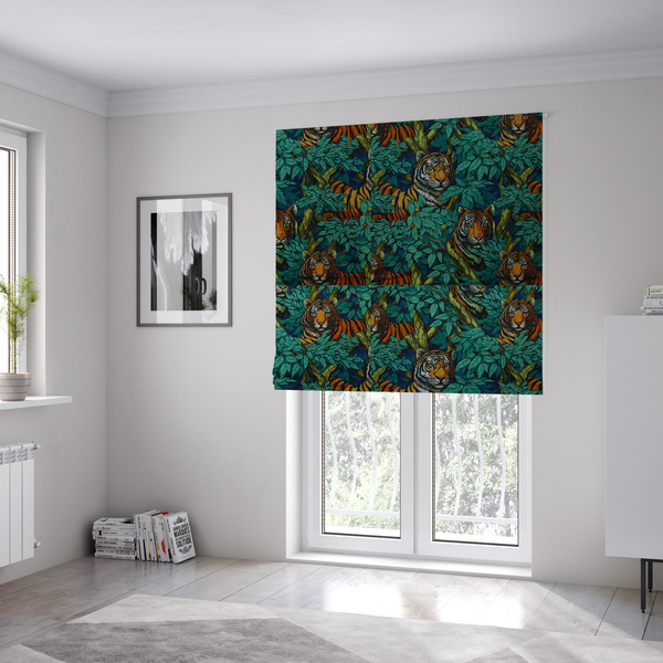 The fabric used to create these Roman blinds is a dark blue fabric patterned with hand-drawn jungle illustrations of tigers nestled among dense green leaves featuring an organic style.