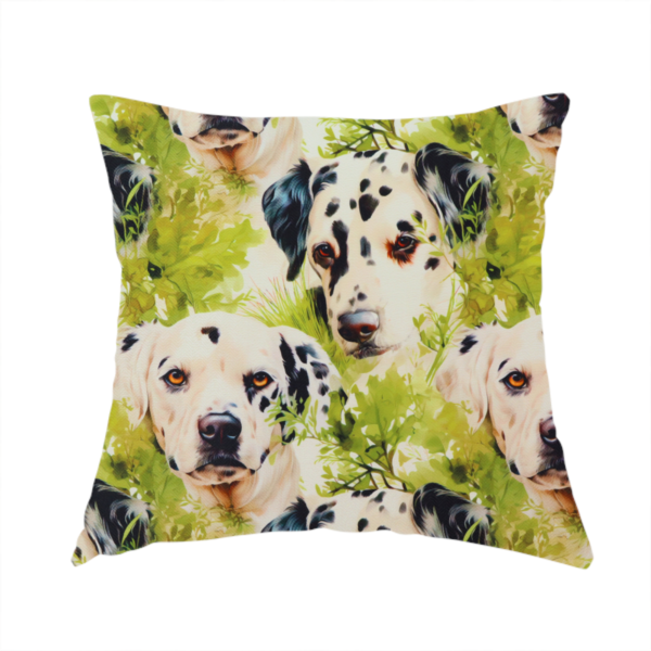 The fabric used to create this handmade cushion is a green and white fabric patterned with hand-drawn illustrations of Dalmatians nestled among lush foliage featuring an organic style.