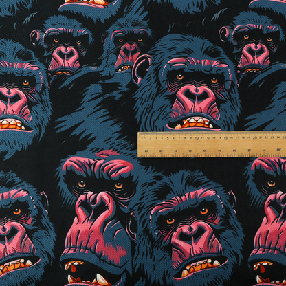 A dark blue fabric patterned with hand-drawn illustrations of gorillas featuring an organic style.   