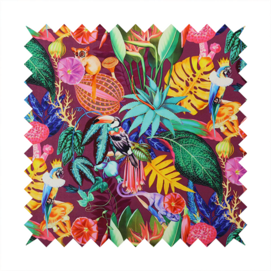 A burgundy fabric patterned with hand-drawn jungle illustrations of toucans, tarsiers, colourful birds, and tropical foliage featuring an organic style.   
