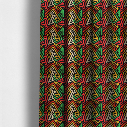 The fabric sued to create these made-to-measure curtains is a repeating geometric fabric pattern on a black background featuring interlocking angular lines in red, yellow, green, and beige.