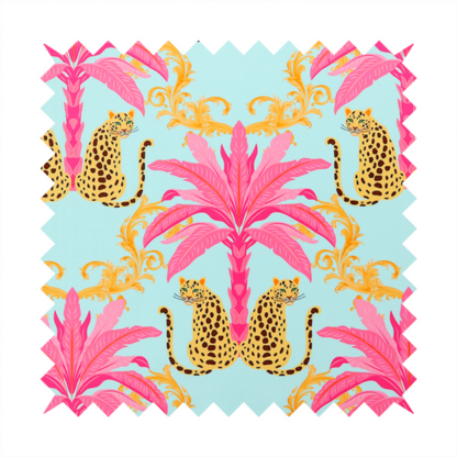A vibrant fabric pattern featuring repeating pairs of leopards, bright pink palm trees, and gold baroque scrollwork against a light blue background.