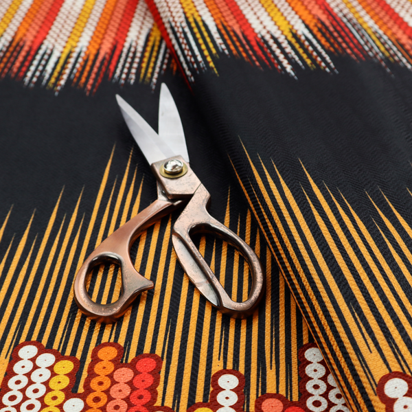 A repeating fabric pattern featuring a soundwave-like design with vertical rows of dots in warm red, orange, yellow, and white tones, separated by a black stripe.