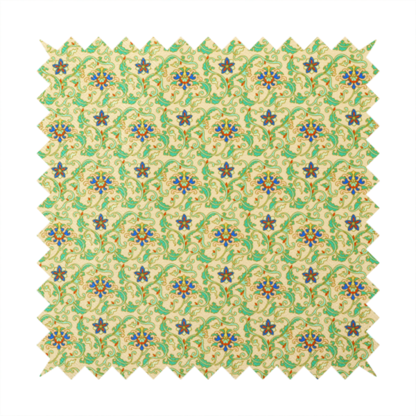 A dense, intricate fabric pattern featuring repeating blue and orange floral blossoms interwoven with teal scrollwork and leafy vines on a light gold background.
