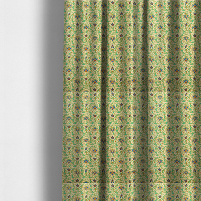 The fabric used to create these made-to-measure curtains is a dense, intricate fabric pattern featuring repeating blue and orange floral blossoms interwoven with teal scrollwork and leafy vines on a light gold background.