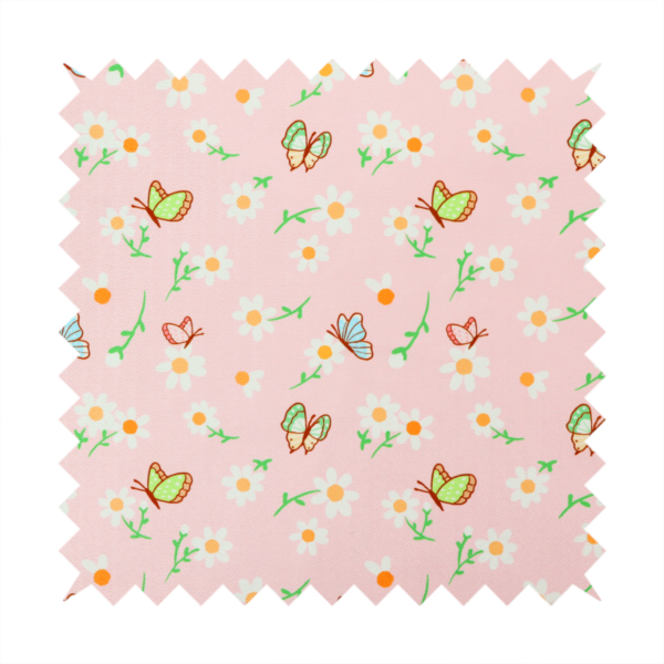 Pink fabric featuring a charming spring pattern with white daisies, green stems, and colourful butterflies in blue, green, and orange scattered across the surface.   
