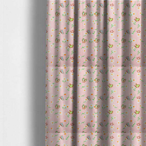 The fabric used to create these made-to-measure curtains is a pink fabric featuring a charming spring pattern with white daisies, green stems, and colourful butterflies in blue, green, and orange scattered across the surface.   