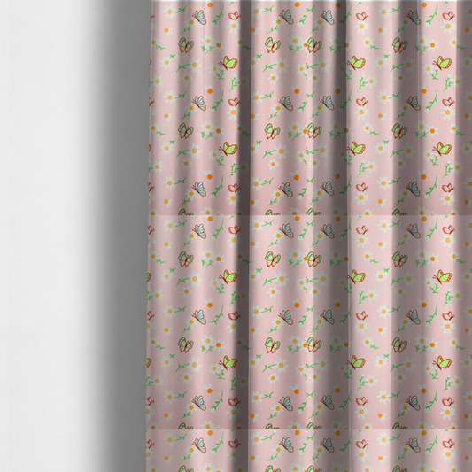 The fabric used to create these made-to-measure curtains is a pink fabric featuring a charming spring pattern with white daisies, green stems, and colourful butterflies in blue, green, and orange scattered across the surface.   