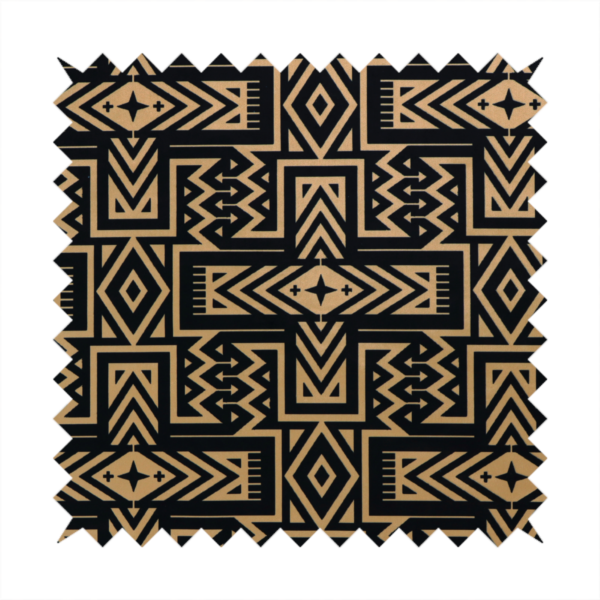 Black and gold geometric fabric featuring an intricate Navajo-inspired tribal pattern with chevron lines, diamonds, and cross motifs.