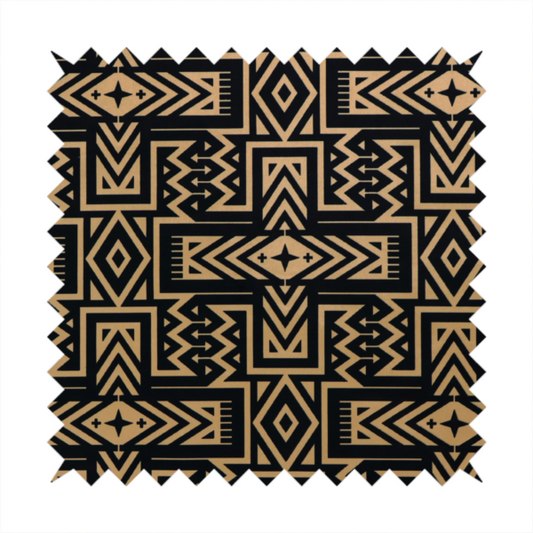 Black and gold geometric fabric featuring an intricate Navajo-inspired tribal pattern with chevron lines, diamonds, and cross motifs.