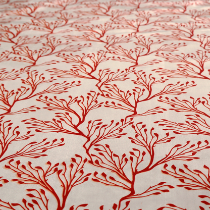 Cream and red fabric featuring an intricate organic branch or sea coral pattern with delicate twig motifs repeating across the surface.   