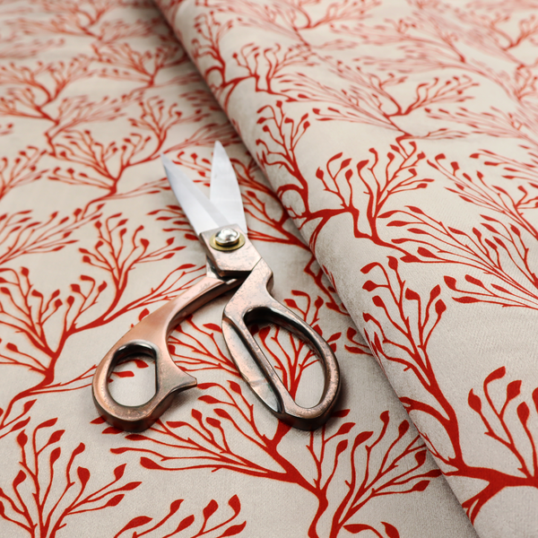 Cream and red fabric featuring an intricate organic branch or sea coral pattern with delicate twig motifs repeating across the surface.   