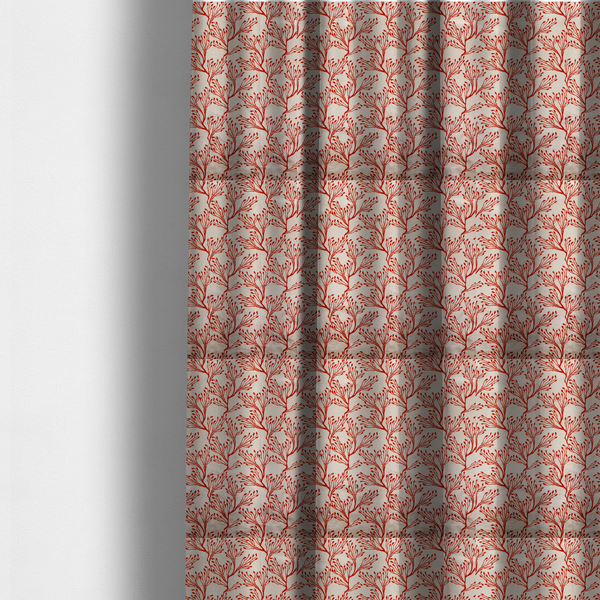 The fabric used to create these made-to-measure curtains is a cream and red fabric featuring an intricate organic branch or sea coral pattern with delicate twig motifs repeating across the surface.   