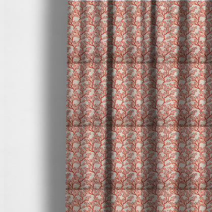 The fabric used to create these made-to-measure curtains is a cream and red fabric featuring an intricate organic branch or sea coral pattern with delicate twig motifs repeating across the surface.   