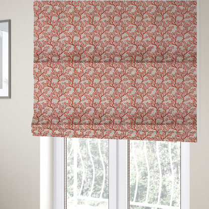 The fabric used to create these Roman blinds is a cream and red fabric featuring an intricate organic branch or sea coral pattern with delicate twig motifs repeating across the surface.   