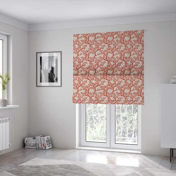 The fabric used to create these Roman blinds is a cream and red fabric featuring an intricate organic branch or sea coral pattern with delicate twig motifs repeating across the surface.   