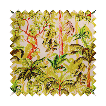 Lush tropical jungle fabric featuring a vibrant botanical pattern with palm trees, banana leaves, and exotic foliage in shades of green, yellow, and red.   