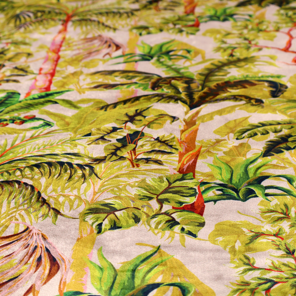 Lush tropical jungle fabric featuring a vibrant botanical pattern with palm trees, banana leaves, and exotic foliage in shades of green, yellow, and red.   