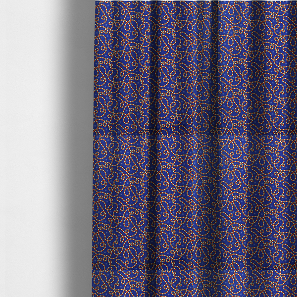 The fabric used to create these made-to-measure curtains is a blue and red fabric featuring an intricate festive pattern with continuous wiggly candy cane lines and tiny white snowflakes scattered across the deep blue background.   