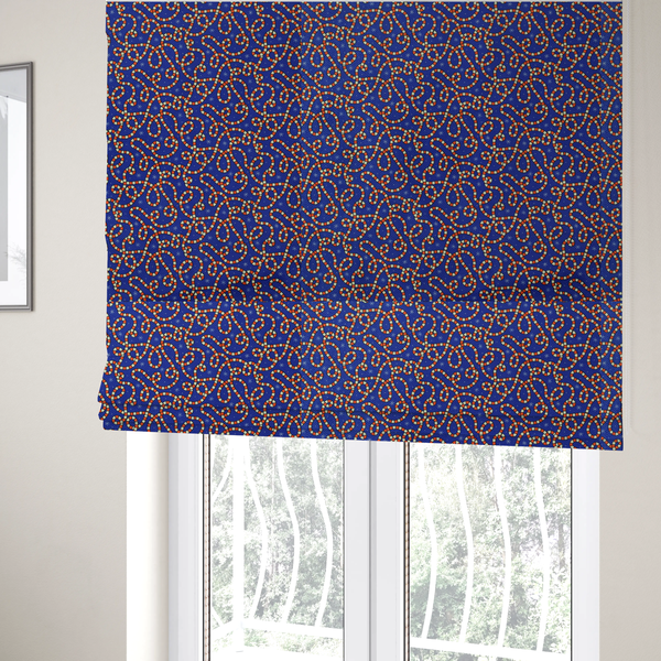 The fabric used to create these Roman blinds is a blue and red fabric featuring an intricate festive pattern with continuous wiggly candy cane lines and tiny white snowflakes scattered across the deep blue background.   