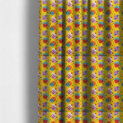 The fabric used to create these made-to-measure curtains is a yellow fabric featuring a playful, quirky pattern with cartoon-style graphics including smiling hearts with crowns, cute diamonds, cartoon bandages, and wacky faces with X eyes on a bright yellow background.   