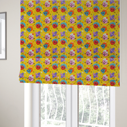 The fabric used to create these Roman blinds is a yellow fabric featuring a playful, quirky pattern with cartoon-style graphics including smiling hearts with crowns, cute diamonds, cartoon bandages, and wacky faces with X eyes on a bright yellow background.   