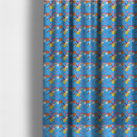 The fabric used to create these made-to-measure curtains is a blue fabric featuring a playful back-to-school pattern with colourful rainbows, basketballs, yellow notebooks with red pencils, purple paper airplanes, and school supplies scattered across a bright blue background.