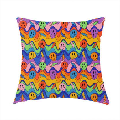The fabric used to create this handmade cushion is a multicolour fabric featuring a psychedelic groove pattern with wavy horizontal stripes in shades of blue, purple, green, yellow, and orange, interspersed with smiling smiley faces and lightning bolts.