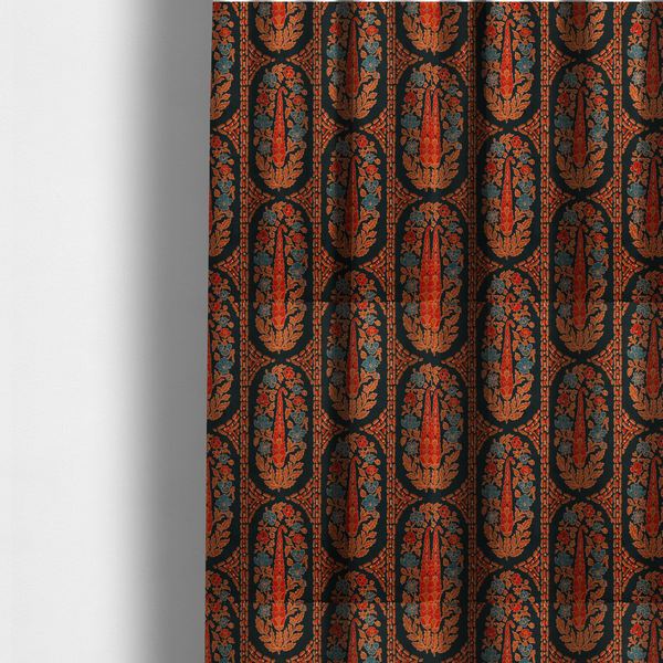 The fabric used to create these made-to-measure curtains is an ornate botanical paisley pattern with large vertical oval medallions filled with red floral motifs, orange leaves, and blue flowers, separated by decorative dashed stripes.
