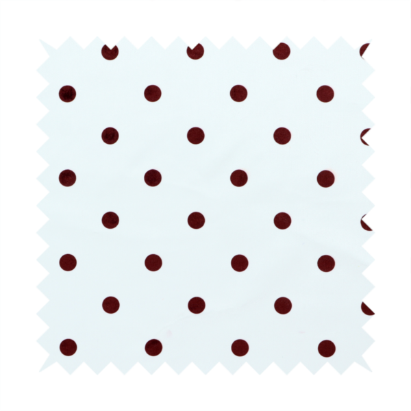 White and brown fabric featuring a classic polka dot pattern with evenly spaced dark dots set against a clean white background.   
PNG