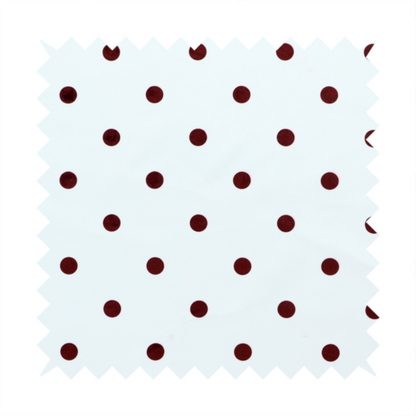 White and brown fabric featuring a classic polka dot pattern with evenly spaced dark dots set against a clean white background.   
PNG