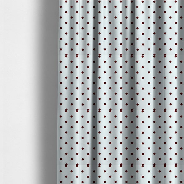 The fabric used to create these made-to-measure curtains is a white and brown fabric featuring a classic polka dot pattern with evenly spaced dark dots set against a clean white background.   
PNG