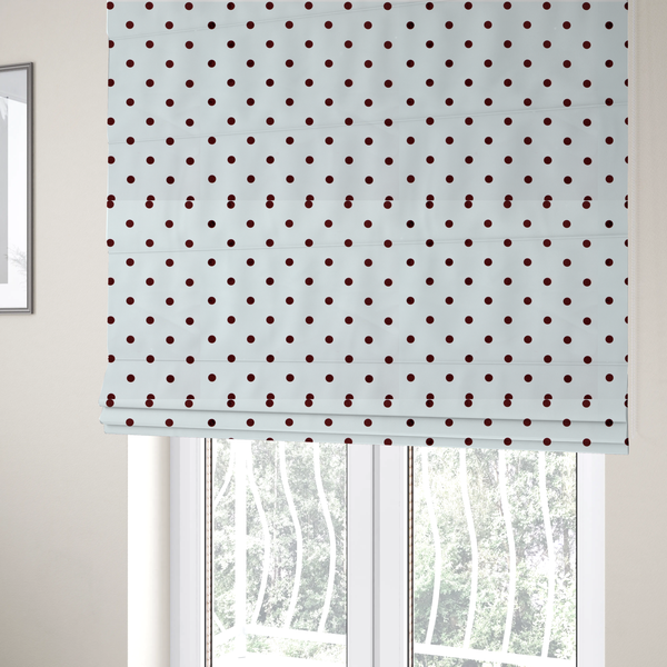 The fabric used to create these Roman blinds is a white and brown fabric featuring a classic polka dot pattern with evenly spaced dark dots set against a clean white background.   
PNG