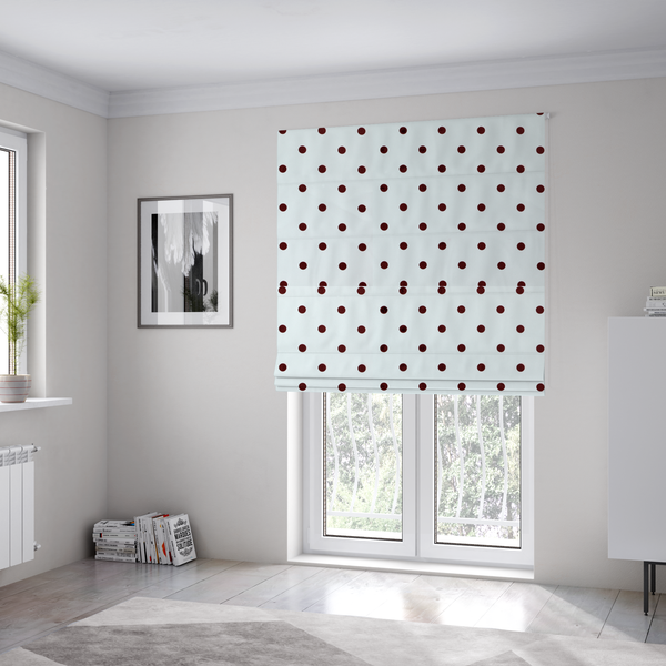 The fabric used to create these Roman blinds is a white and brown fabric featuring a classic polka dot pattern with evenly spaced dark dots set against a clean white background.   
PNG